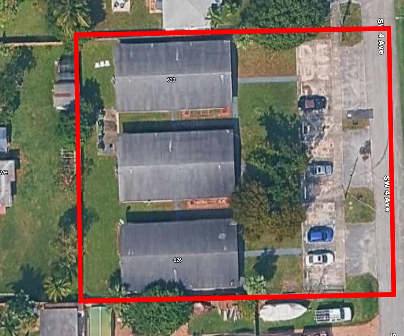 Aerial view of three multifamily buildings on a 22,469 sq ft combined lot on SW 4th Avenue, Hallandale Beach
